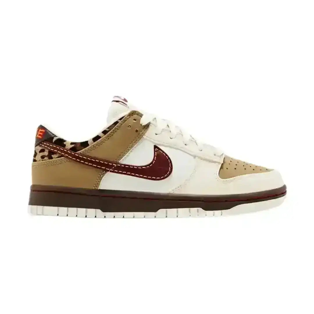 Nike Dunk Low Retro SE sneaker with animal-print inspired heel panel, blending heritage design elements with contemporary streetwear appeal.
