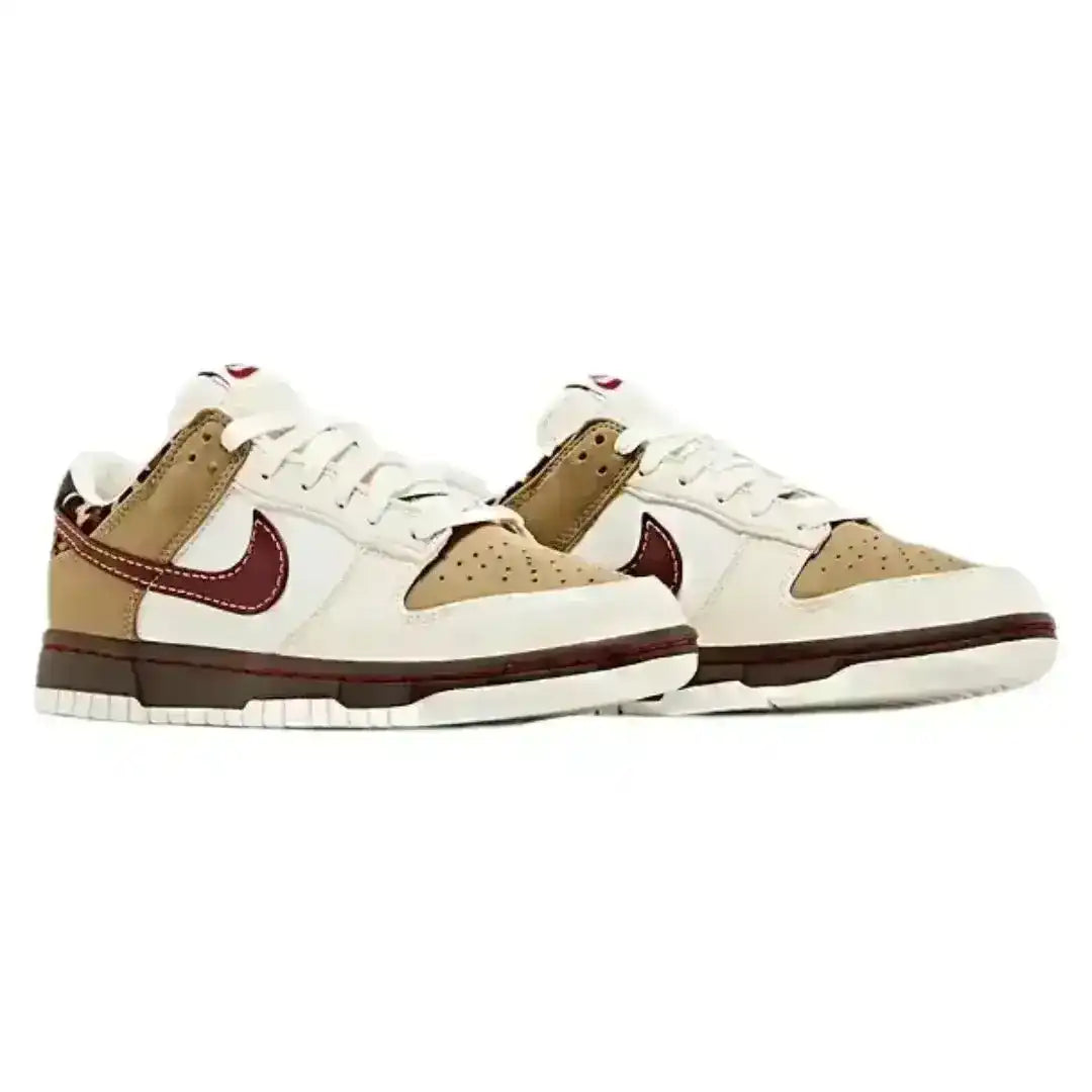 Nike Dunk Low Retro SE Cheetah sneaker designed with premium materials, showcasing a classic Dunk shape enhanced by textured accents and a bold Nike swoosh.
