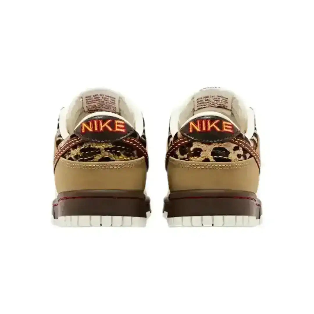 Side view of the Nike Dunk Low Retro SE Cheetah edition, highlighting its retro basketball roots combined with modern lifestyle styling.
