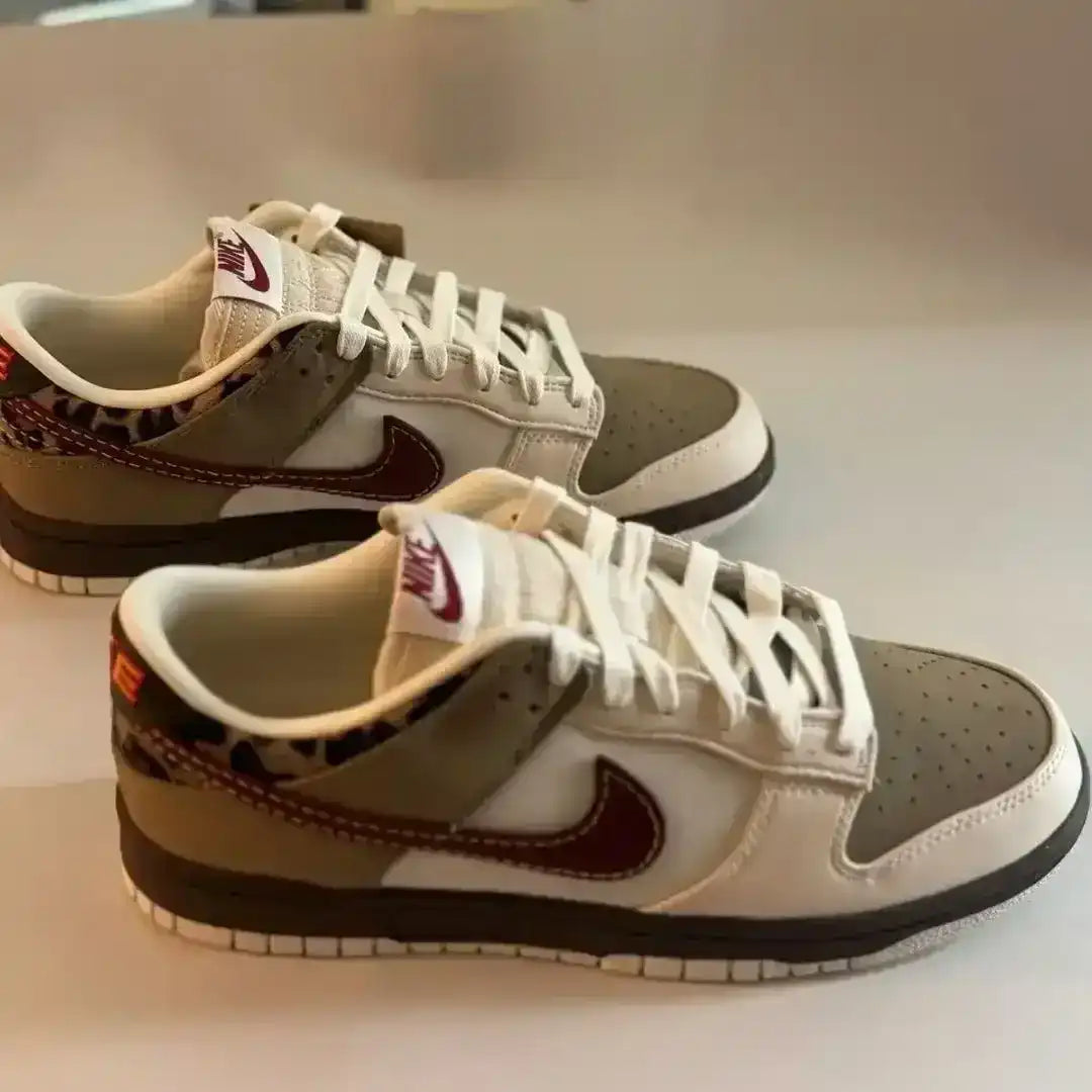 Nike Dunk Low Retro SE Cheetah edition with retro-inspired proportions, lace-up closure, and a balanced silhouette suited for daily use.
