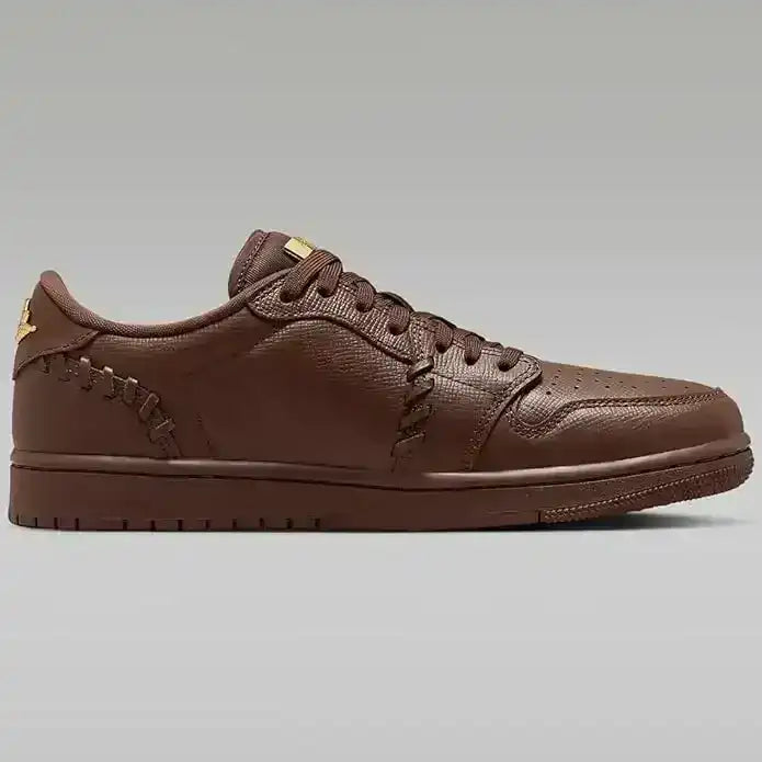 Low-top sneakers with gold-colored swoosh details, product views.