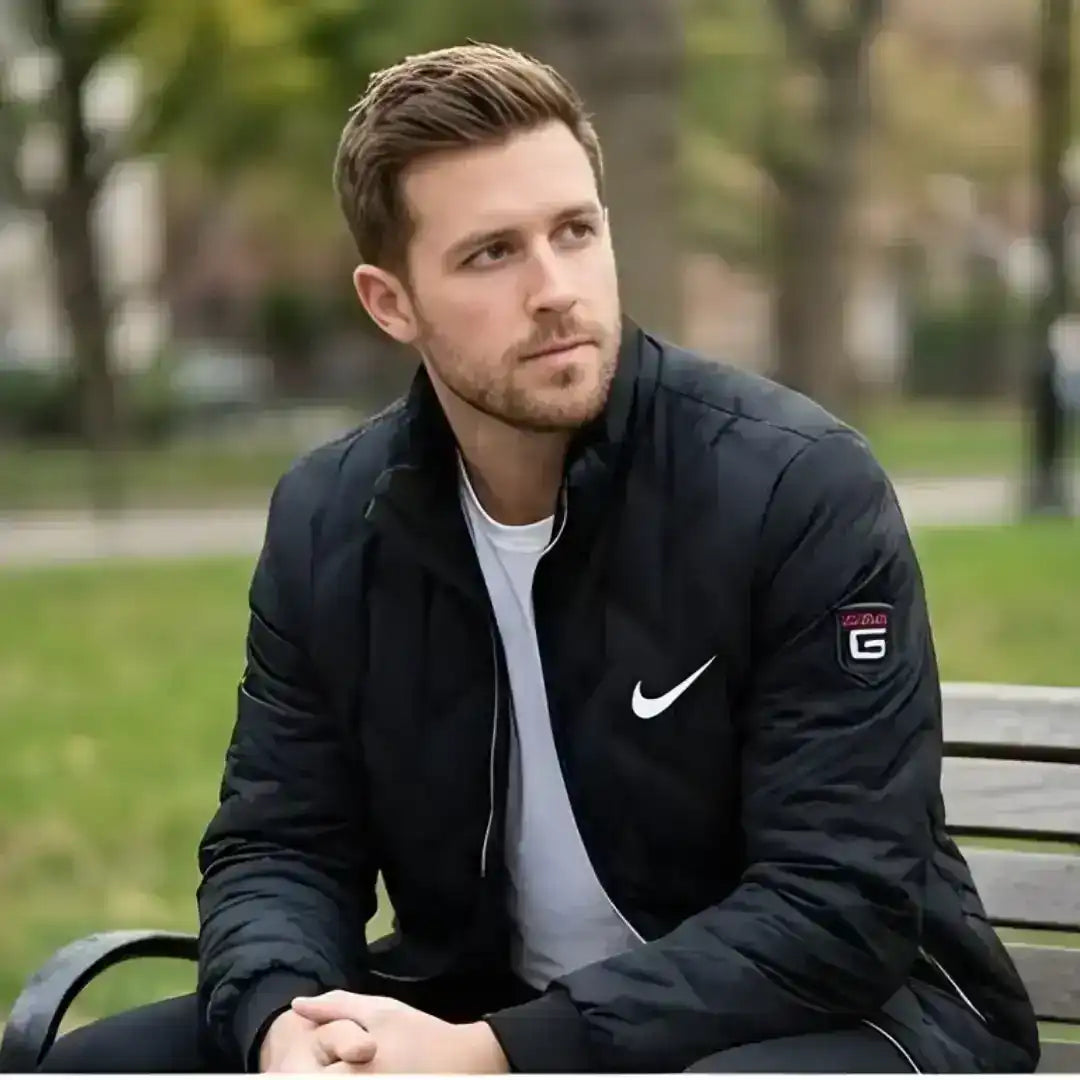 Back view of Nike casual winter jacket showing relaxed silhouette and branding details