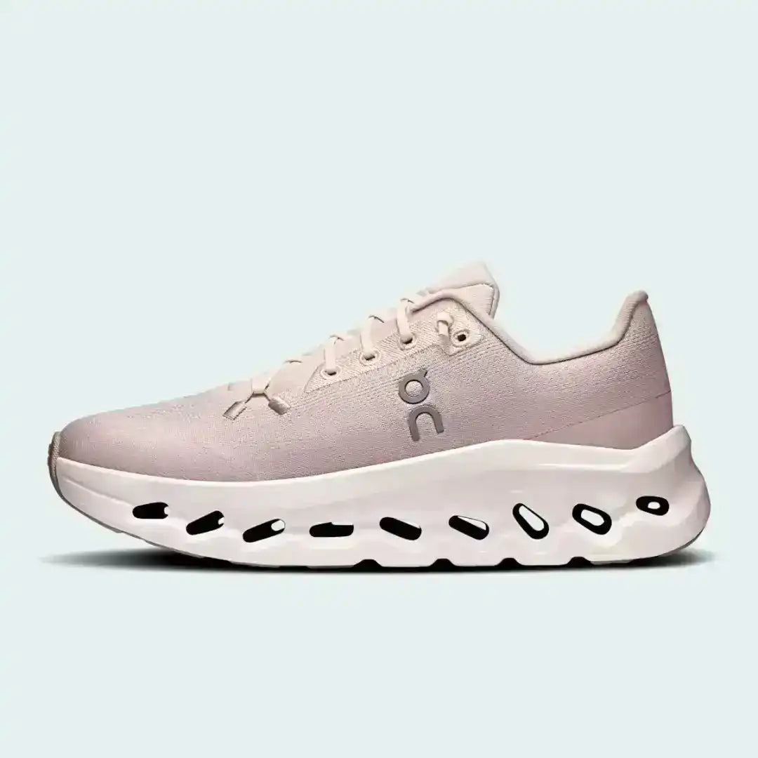 Pale pink lace-up sneakers with cutout-style midsoles, product views.
