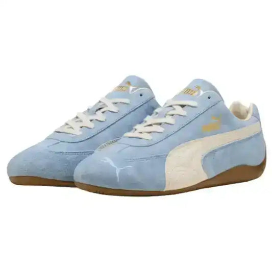 Light blue sneakers with white accents on a white background