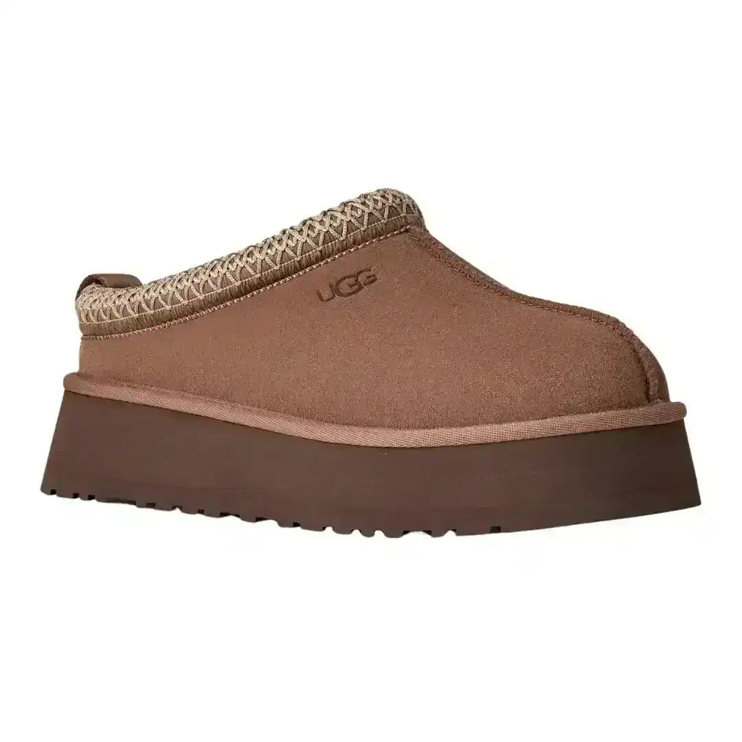 Women's UGG Tazz suede clogs in brown with embroidered braid, perfect for cozy autumn vibes and comfortable daily walking style.