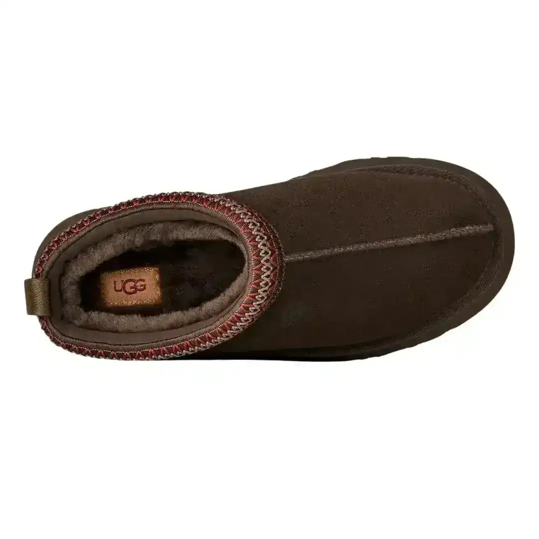 Sleek dark brown UGG Tazz mule slippers with platform bottom, ideal for elevating simple leggings and hoodie outfits instantly right now.