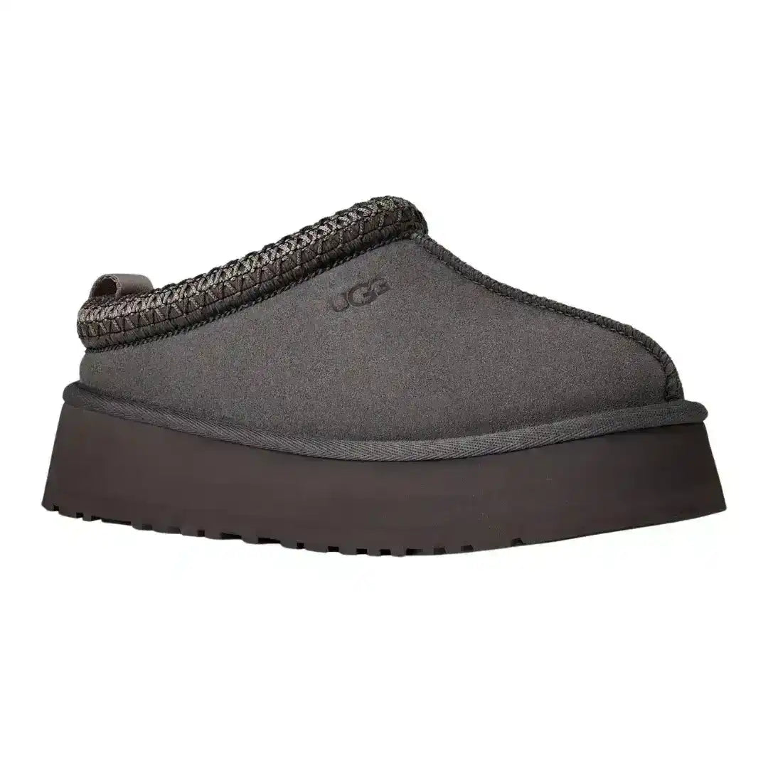 Sleek dark grey UGG Tazz mule slippers with platform bottom, ideal for elevating simple leggings and oversized hoodie outfits instantly.
