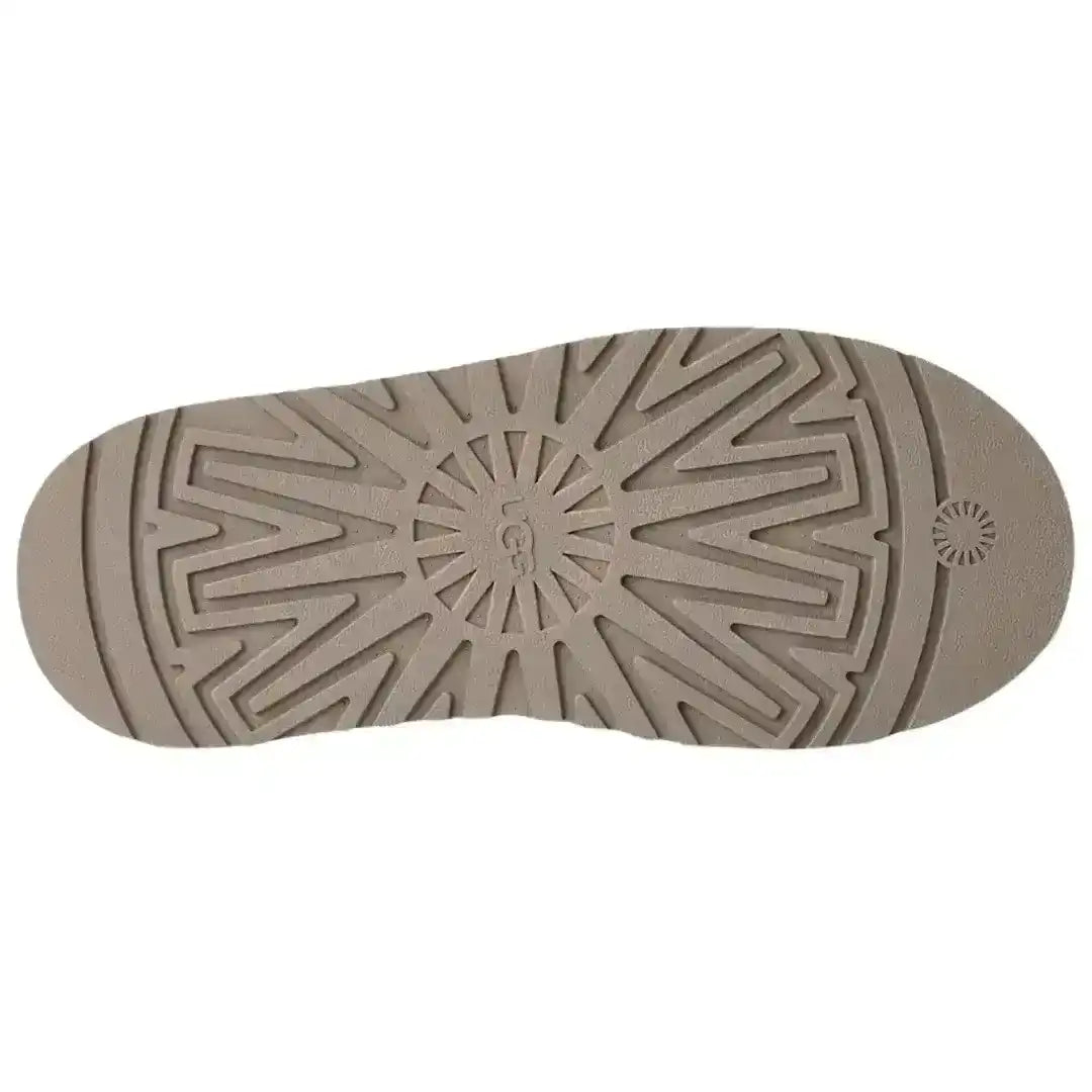 Light beige UGG Tazz platform slippers with Tasman braid, perfect for neutral outfits and clean girl aesthetic fashion looks today.