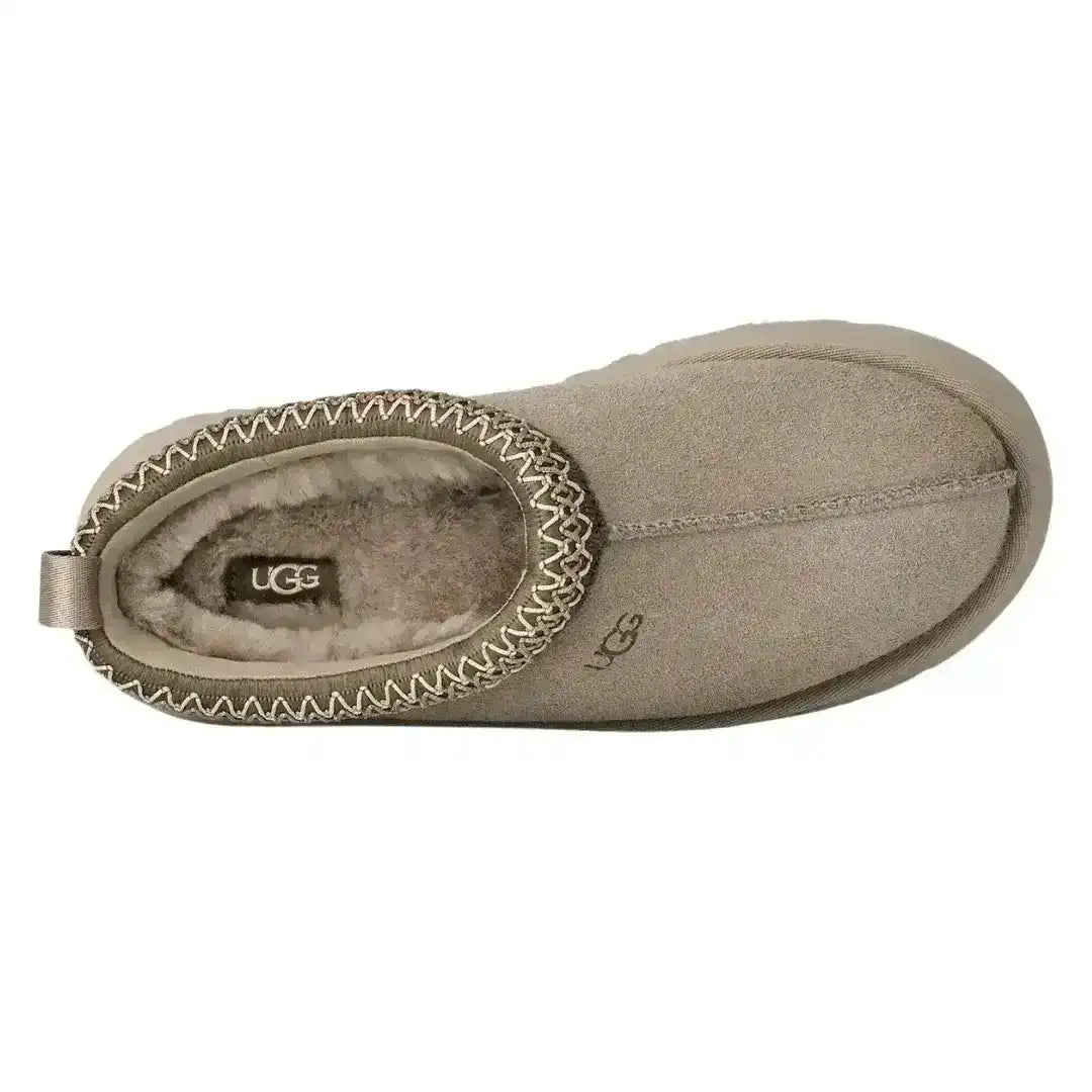 Soft light beige UGG Tazz slippers with tonal braid detail, ideal for matching with cream loungewear sets for a luxurious home vibe.