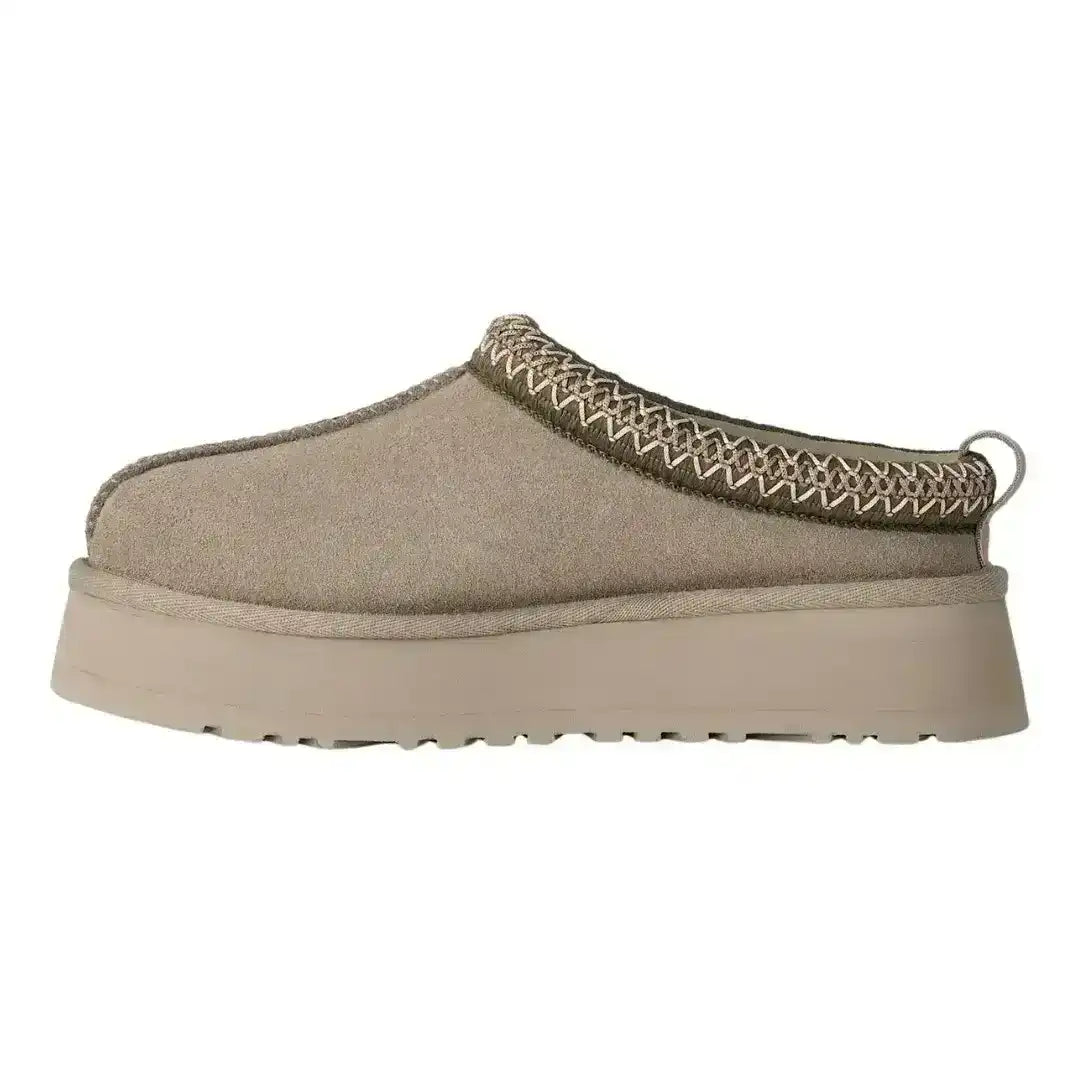 Sand beige UGG Tazz platform clogs, a fresh and modern colorway that brightens up dark winter clothing ensembles effortlessly well.