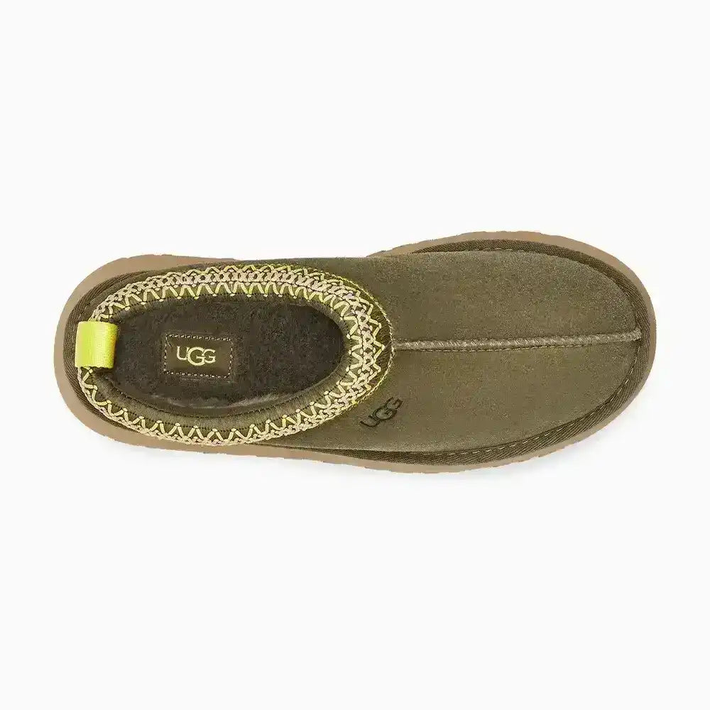 Women's UGG Tazz moss green suede slippers with chunky sole, trending footwear for casual street style and cozy home lounging comfortably.