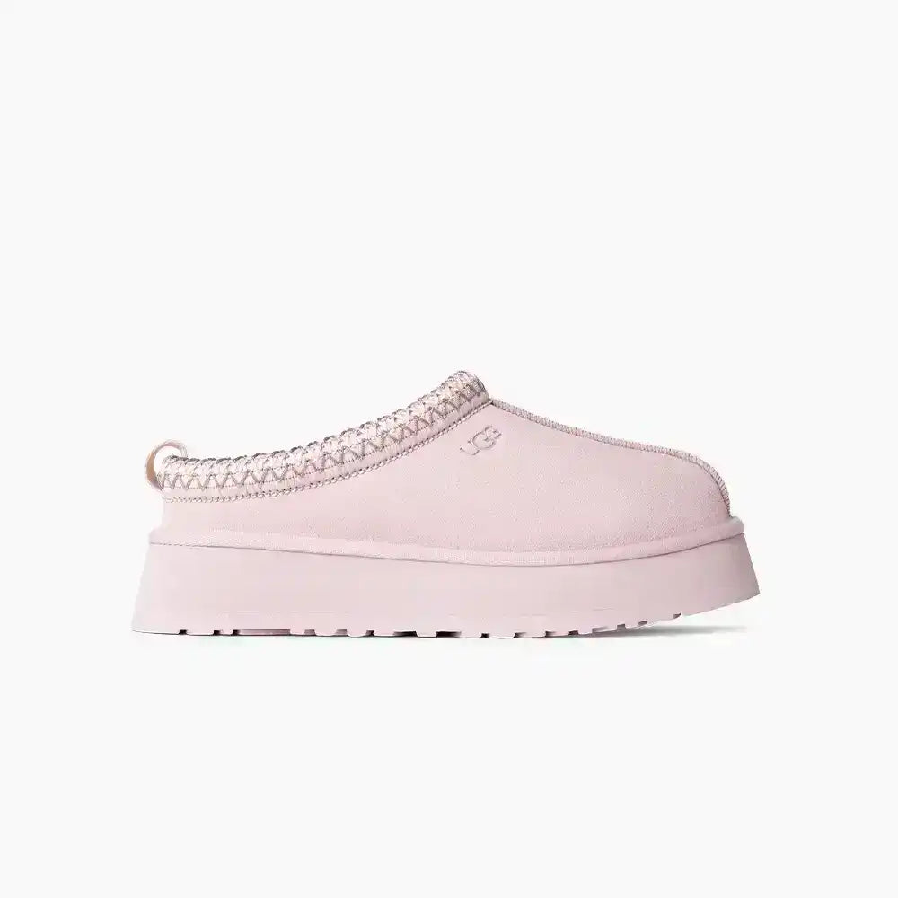 Pink UGG Tazz slippers with platform sole and braid detail, ideal for cute coquette aesthetic looks and cozy winter fashion styles.