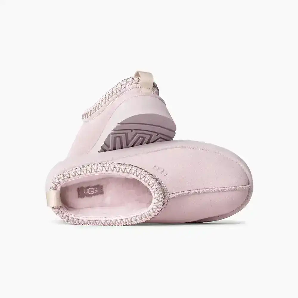 Adorable pink UGG Tazz platform clogs, a trending footwear choice for Barbiecore fans and those who love playful fashion statements.