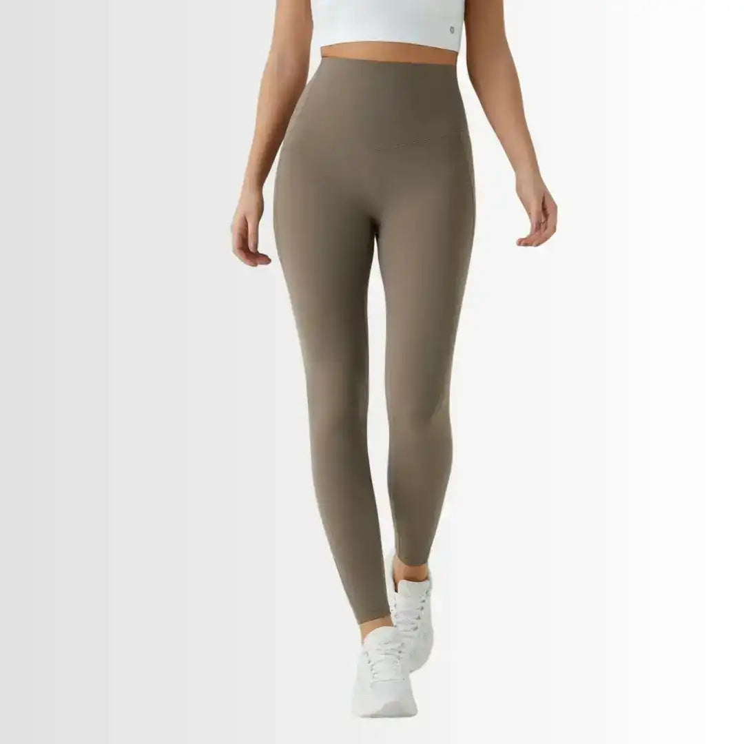 High-waisted leggings with curved seams, product and model views.