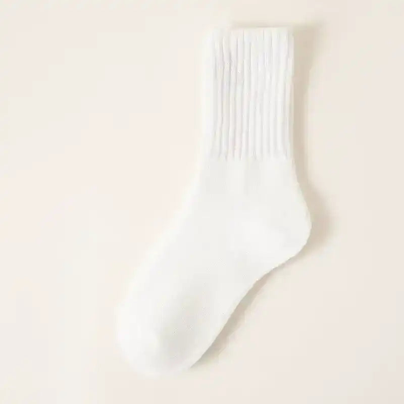 Ribbed crew socks in neutral colors, product and styling views.