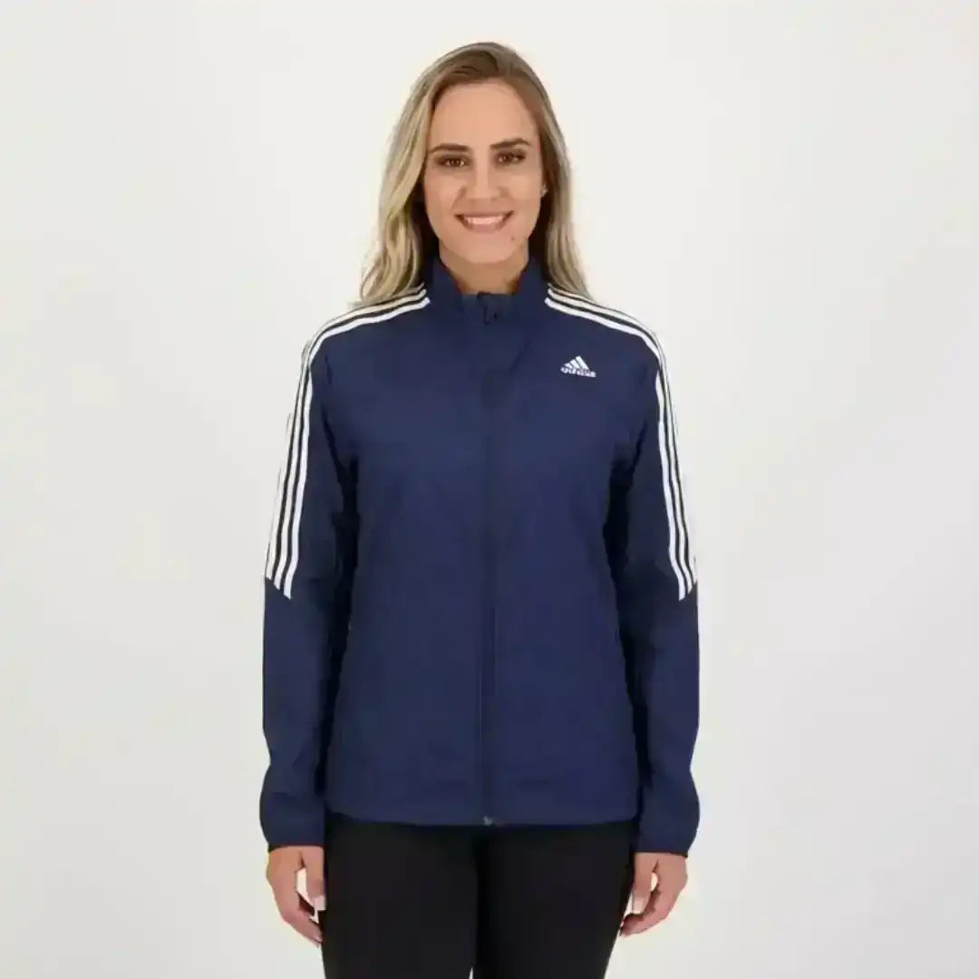 Adidas dark blue zip-up jacket with classic three-stripe styling
