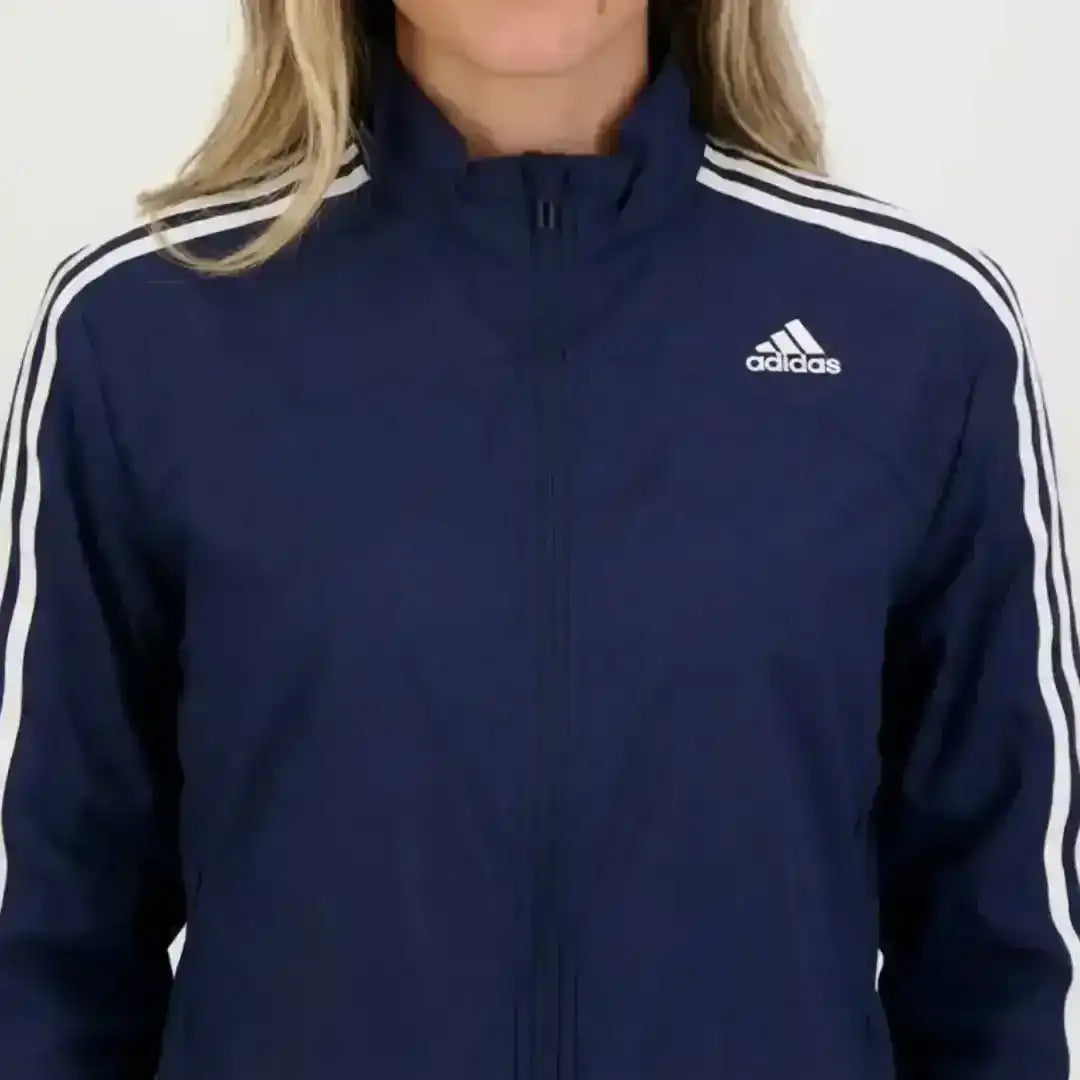 Adidas dark blue track jacket designed for training and comfort
