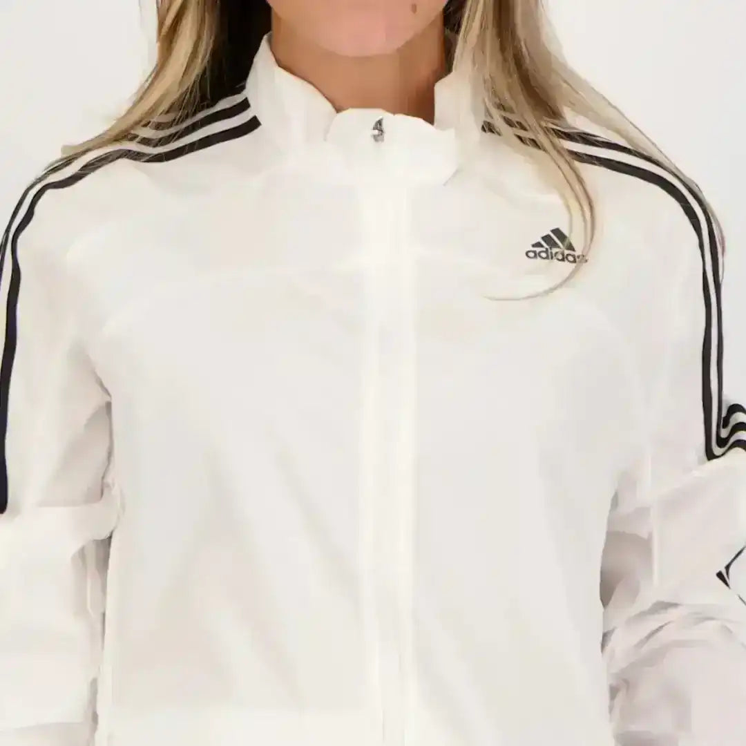 Adidas white track jacket designed for training and casual wear
