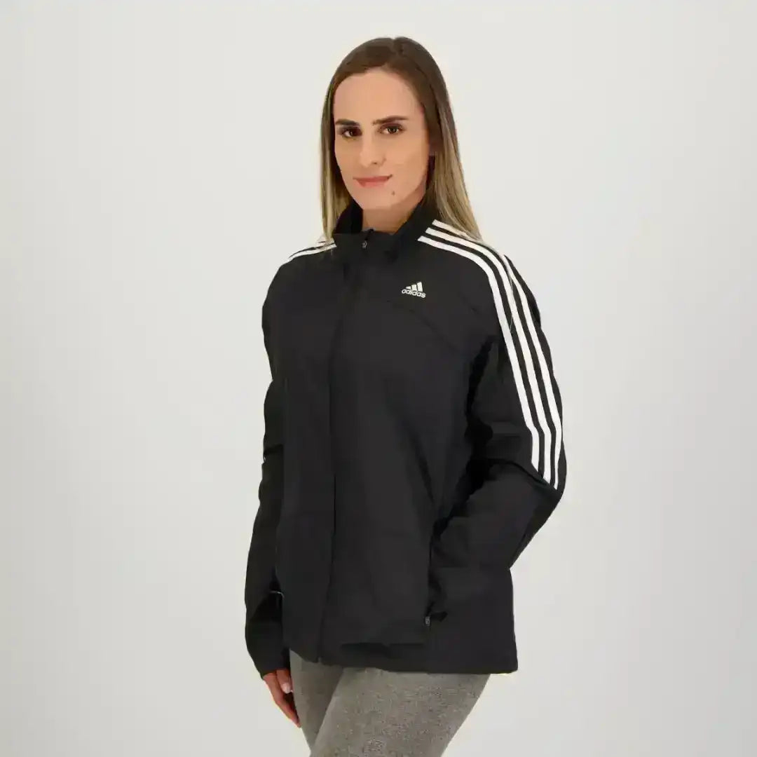 Adidas black sports jacket with high collar and modern fit
