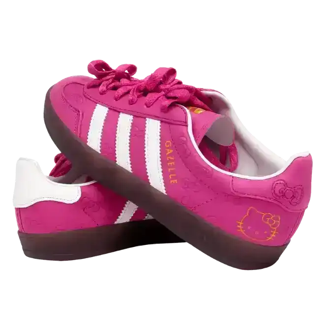 Adidas Gazelle Hello Kitty sneakers in vivid pink leather featuring an all-over embossed bow pattern, contrasting white stripes, and a cute gold Hello Kitty face graphic on the lateral heel.