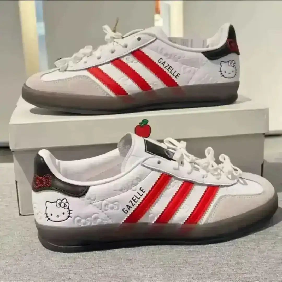 ADIDAS GAZELLE HELLO KITTY WHITE RED STRIPES - AUTHENTIC SANRIO COLLABORATION 2025
Classic White & Red Hello Kitty Adidas Gazelle Sneakers - Limited Edition Women's Shoes
Introducing the iconic Adidas Gazelle Hello Kitty White with Red Stripes - the most coveted sneaker collaboration of 2025! These stunning white Hello Kitty Adidas Gazelle sneakers combine timeless Adidas design with adorable Sanrio Hello Kitty kawaii a