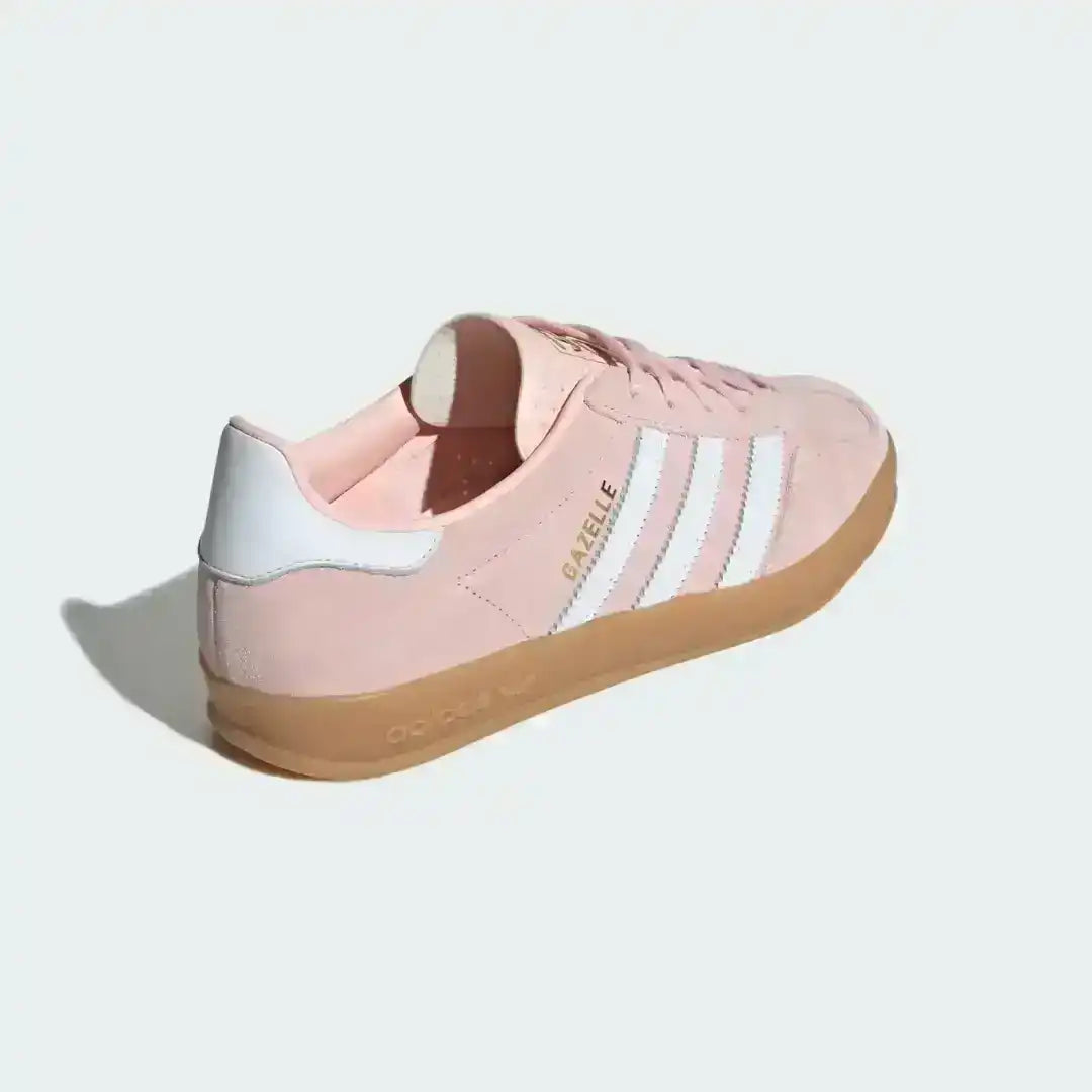 Adidas Gazelle Indoor Bliss Pink sneakers, emphasizing the contrast between the soft suede upper and the translucent gum rubber sole unit.