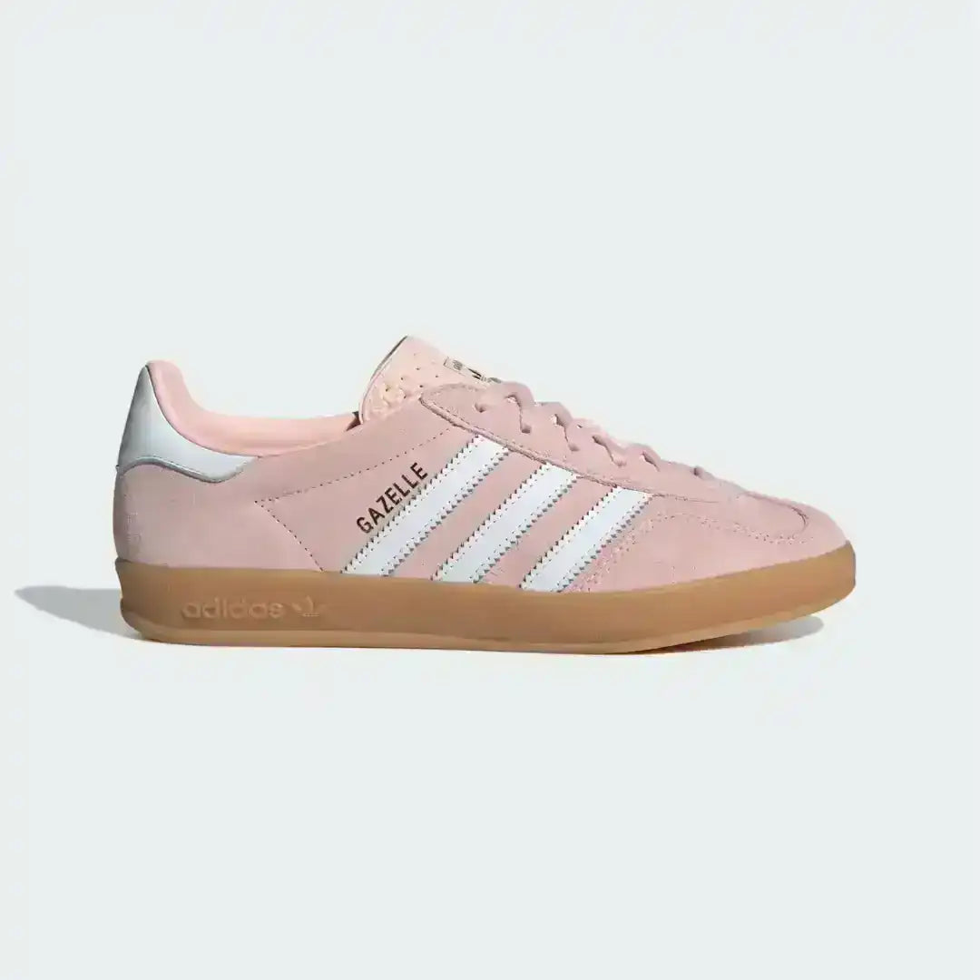 Detailed look at the Adidas Gazelle Indoor Pink Suede edition, focusing on the high-quality material finish, serrated leather stripes, and the classic T-toe overlay.