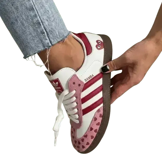 Angled view of the limited edition Adidas Love Heart Pink sneakers styled for a soft girl aesthetic