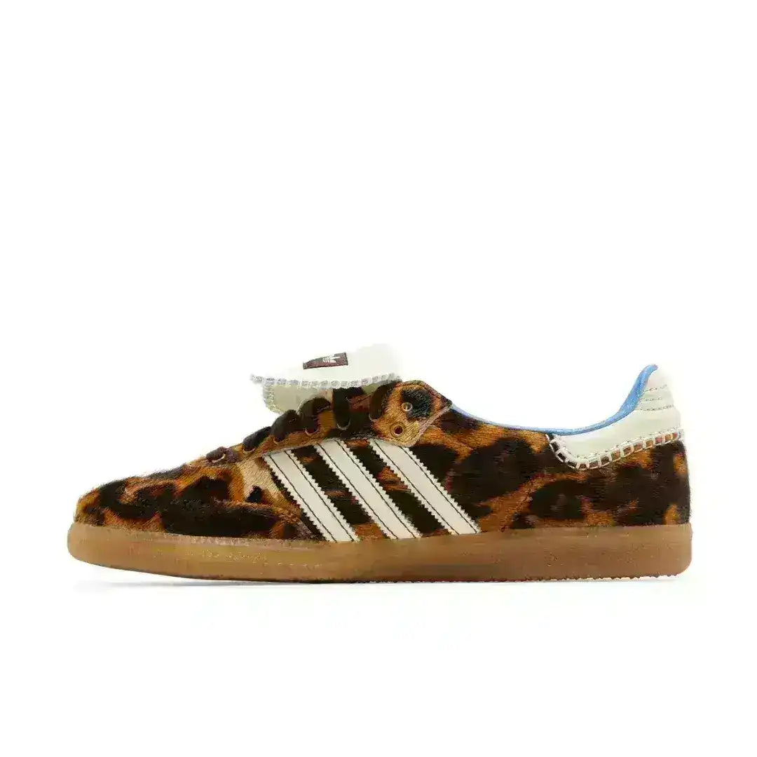 Adidas Samba Leopard low-top sneaker featuring a streamlined profile, lace-up closure, and heritage detailing inspired by classic football training shoes.
