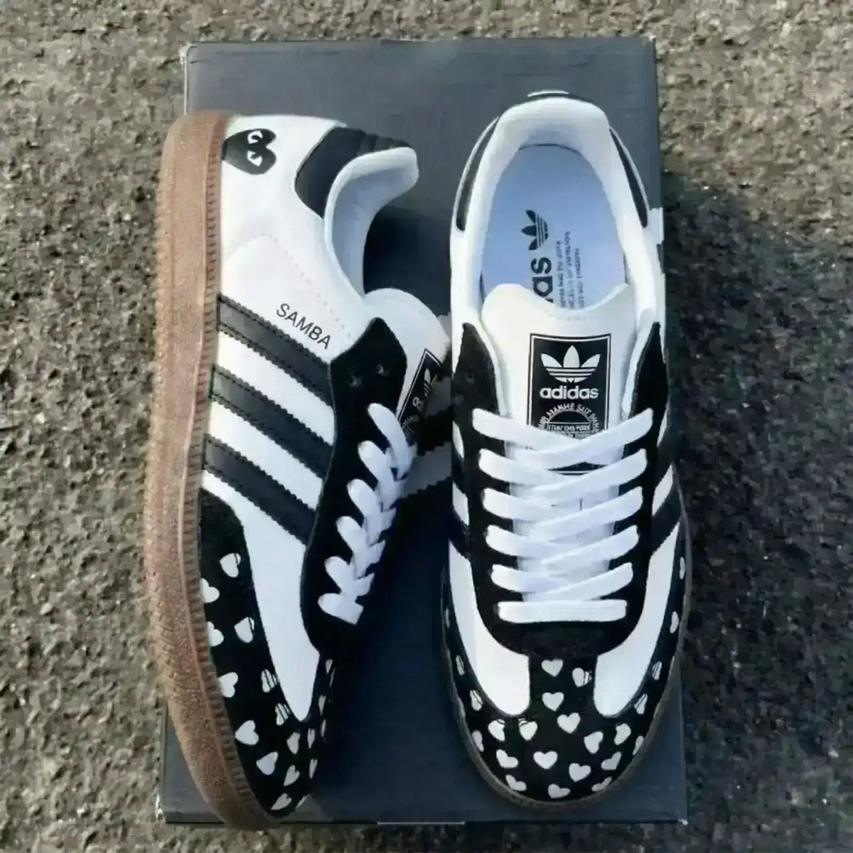 Adidas Love Heart 2026 special edition sneaker in black featuring custom white heart pattern on the toe box