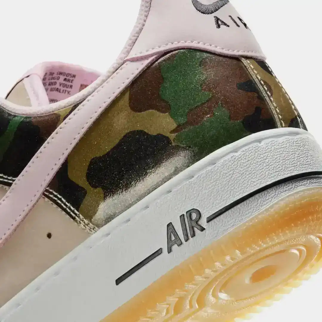 A fresh twist on the AF1 Low with glossy camo textures, pink Swoosh detailing, and signature Air cushioning for standout everyday street style.