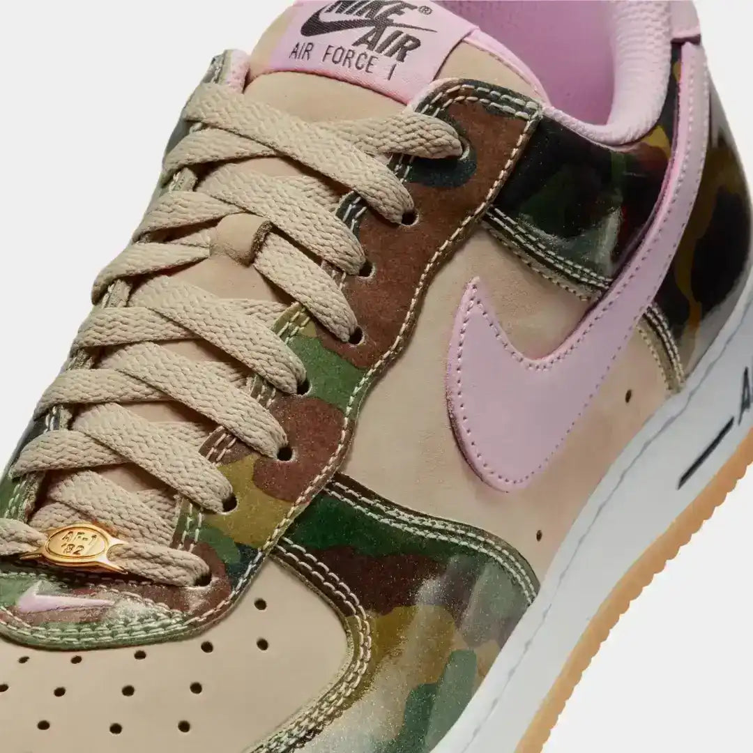 The AF1 “Patent Camo Pink” blends camo gloss, premium detailing, and soft pink tones for a unique streetwear aesthetic with classic Nike Air comfort.