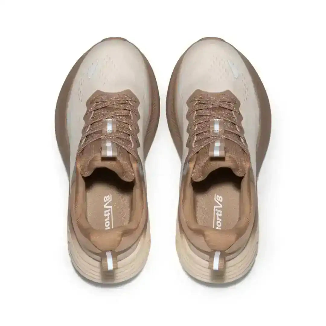 A supportive platform sole, breathable mesh, and cushioned comfort make these beige/khaki running sneakers ideal for all-day wear.