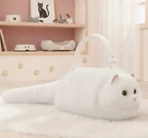 Fuzzy cat-shaped handbag with a handle and long tail detail.
