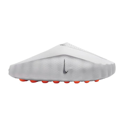 White backless footwear with a textured footbed and orange raised pods.
