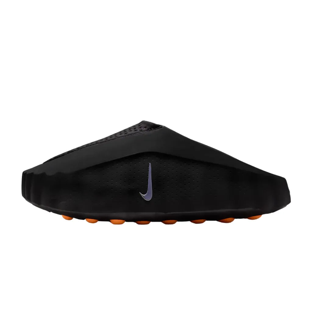 Black backless footwear with orange raised footbed pods, side view.