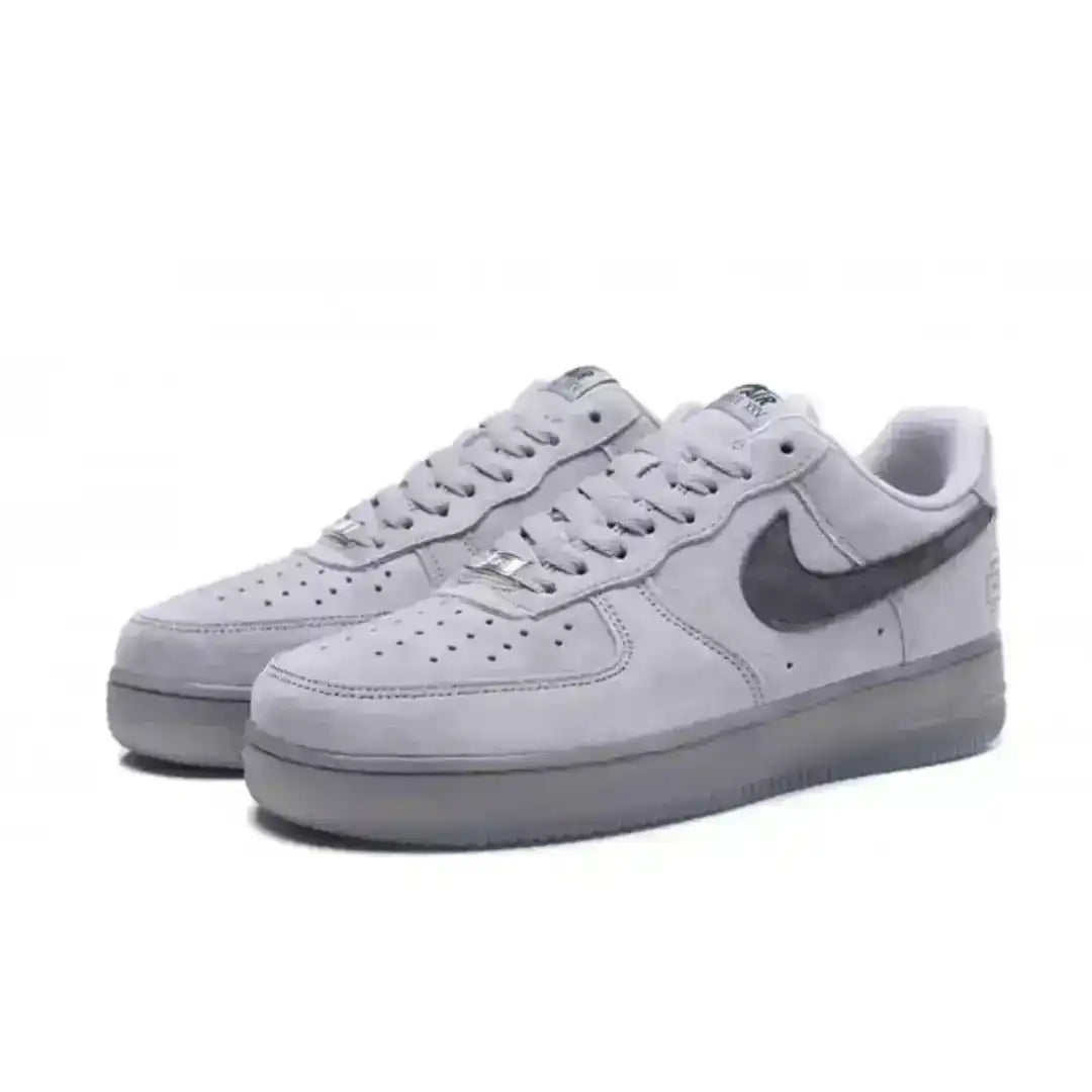 Experience the Nike Air Force 1 Reigning Champ Dark Grey, crafted with soft suede, clean lines, full cushioning, and a sleek dark-toned look for everyday style.