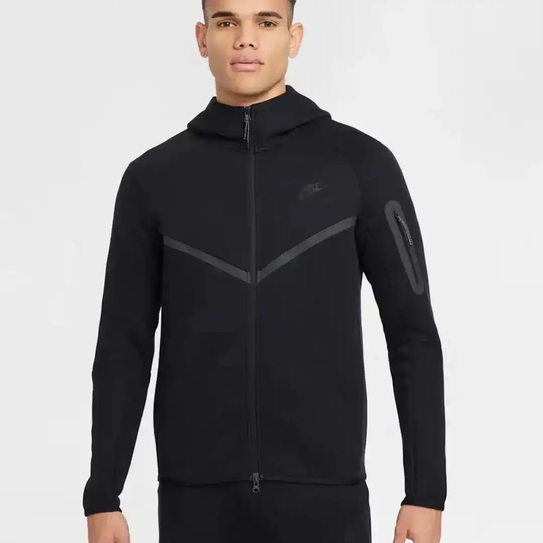 Hooded zip-front sweatshirt and matching joggers with contrast panel details.