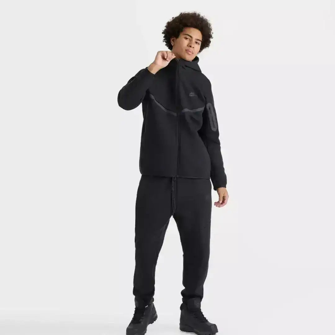 Hooded zip-front sweatshirt and matching joggers with contrast panel details.