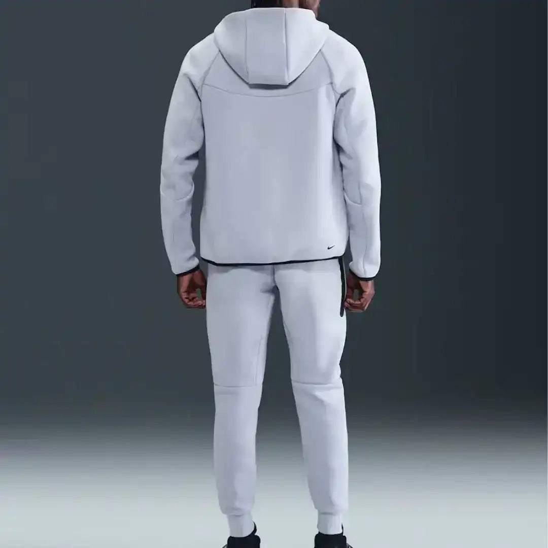 Hooded zip-front sweatshirt and matching joggers with contrast panel details.