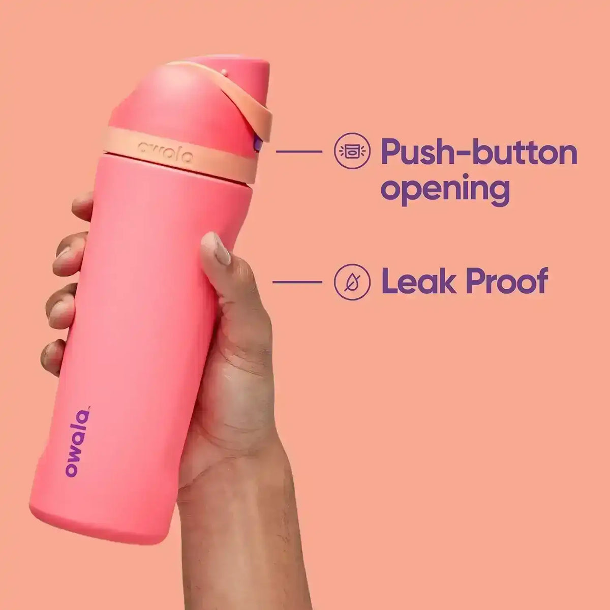 Pink water bottle with push-button opening and leak-proof feature on a peach background